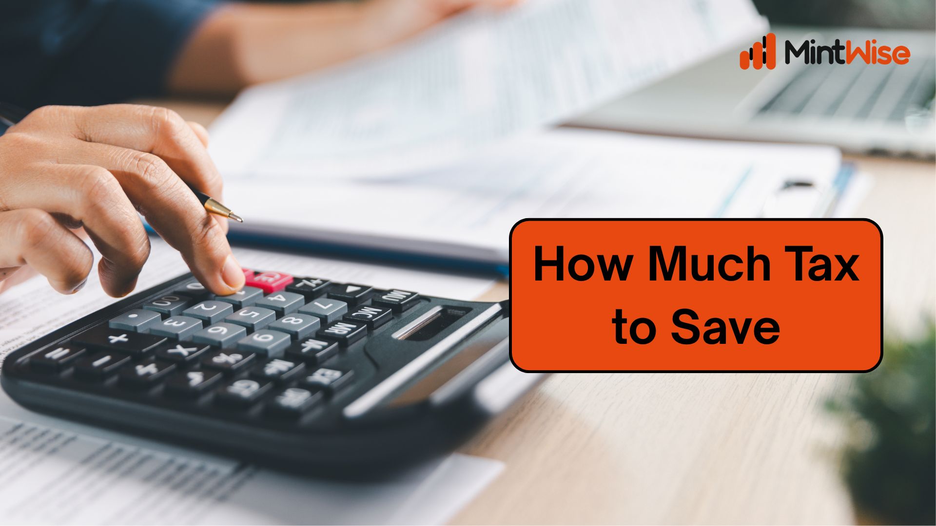 Person reviewing tax saving investment options and calculator on desk Featured Image Caption: Smart tax planning starts with knowing how much tax to save each year.