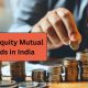 Best Equity Mutual Funds in India – investor adding a coin to stacks of money for mutual fund investment