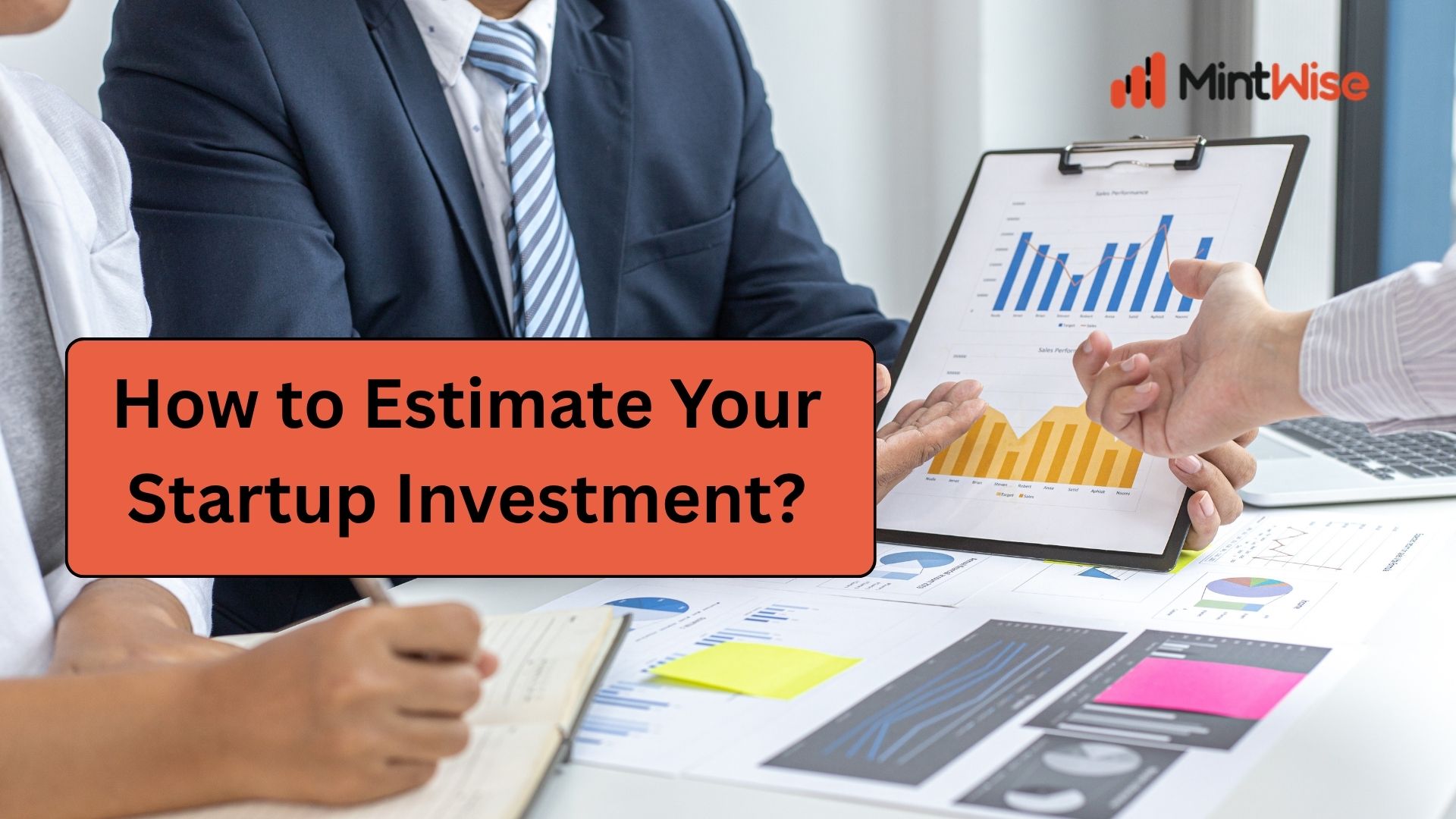 How to Estimate Your Startup Investment Business professionals reviewing startup investment charts and financial data during a meeting.