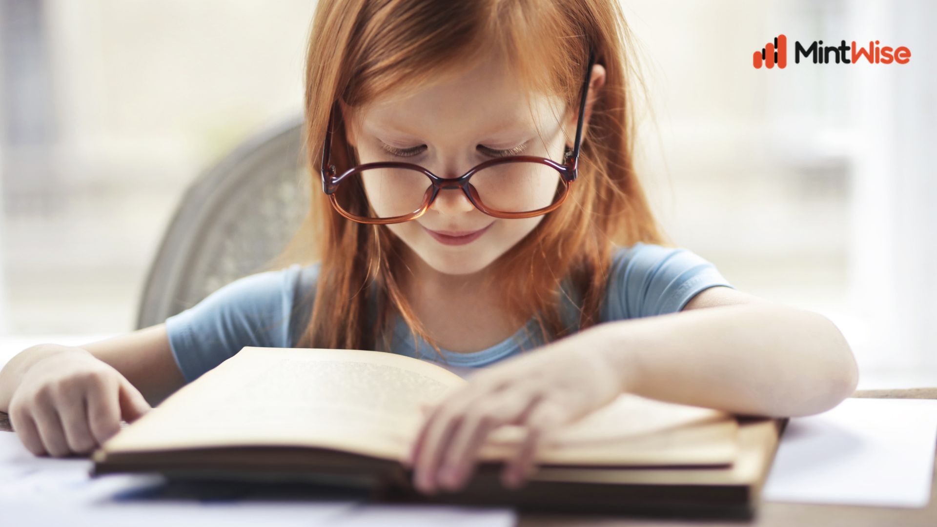 Child reading a book while planning for future education costs
